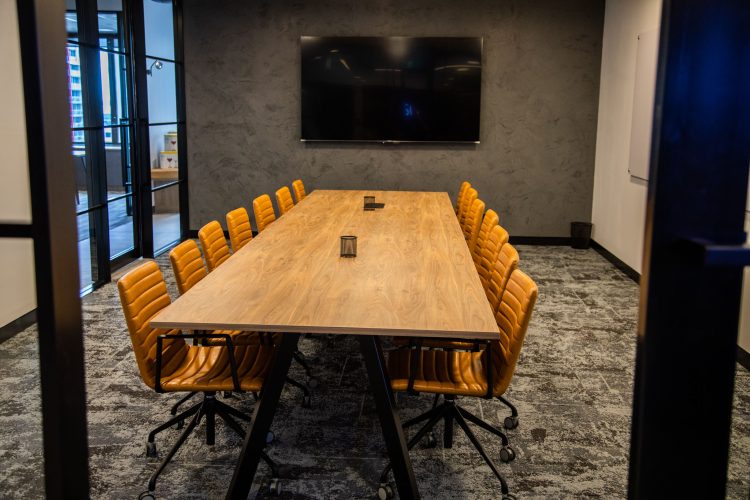 Board room with tan leather chairs
